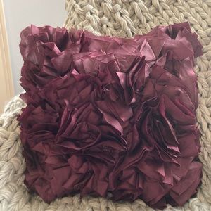 Ruffled accent pillow from Pier 1 in plum/grape color.